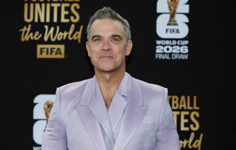 Robbie Williams responds to claims cocaine fell from his face onto microphone during World Cup TV interview