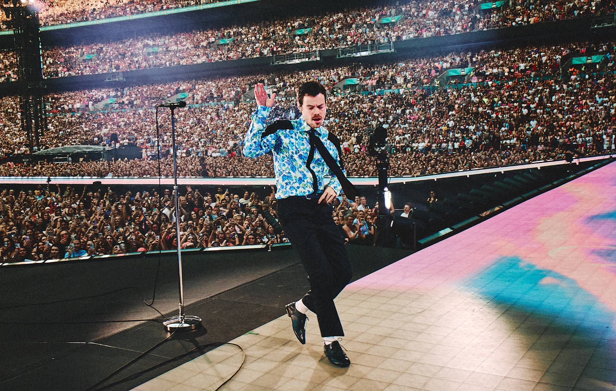 Harry Styles closes record-breaking Wembley residency with Pride celebration and appearance from sister Gemma