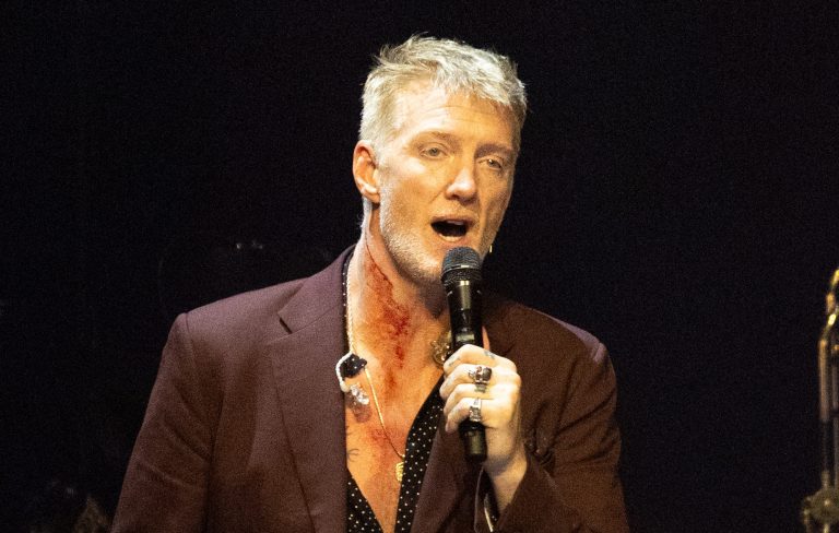 Queens Of The Stone Age’s Josh Homme defies $10k smoking fine at Detroit’s Ford Field: “Don’t let these fucking corporate assholes tell you what to do”