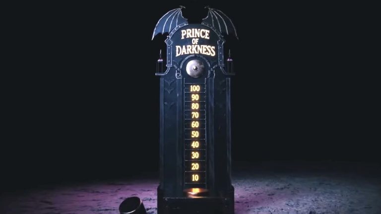 “You’re going to see an oversized bat eat the head off of a human.” Take a look inside Universal Studios’ Ozzy Osbourne: Prince of Darkness haunted house
