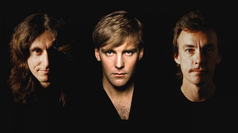Alex Lifeson on the battle behind Rush’s most divisive song, Subdivisions. “I was sitting there thinking, I can’t hear guitar”