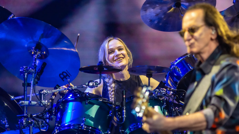 “She’s all that and a bag of chips.” Onstage pranks prove Anika Nilles is unfazed by life as Rush drummer