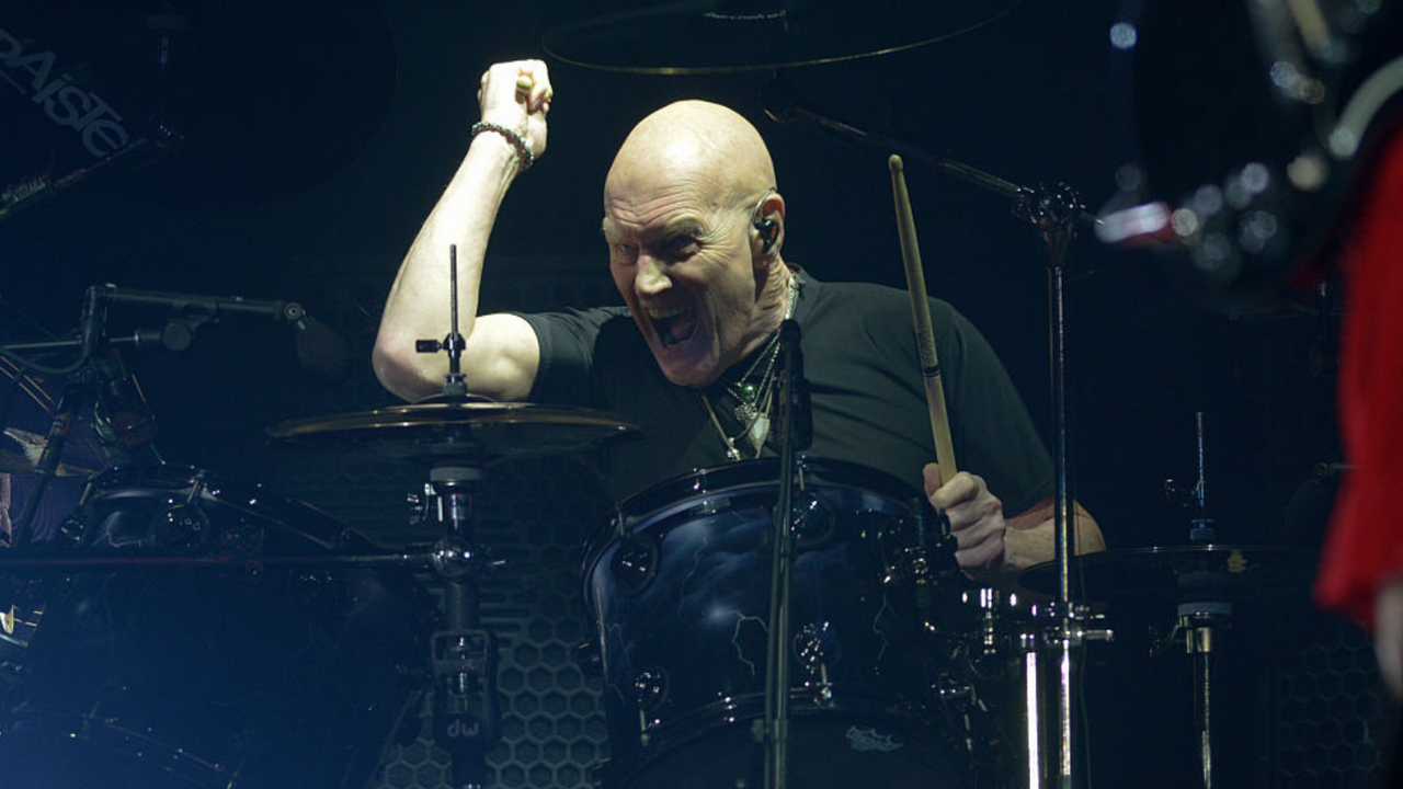 “It’s with a heavy heart that I’m announcing my retirement from drumming.” Former AC/DC man Chris Slade calls time on career at 79
