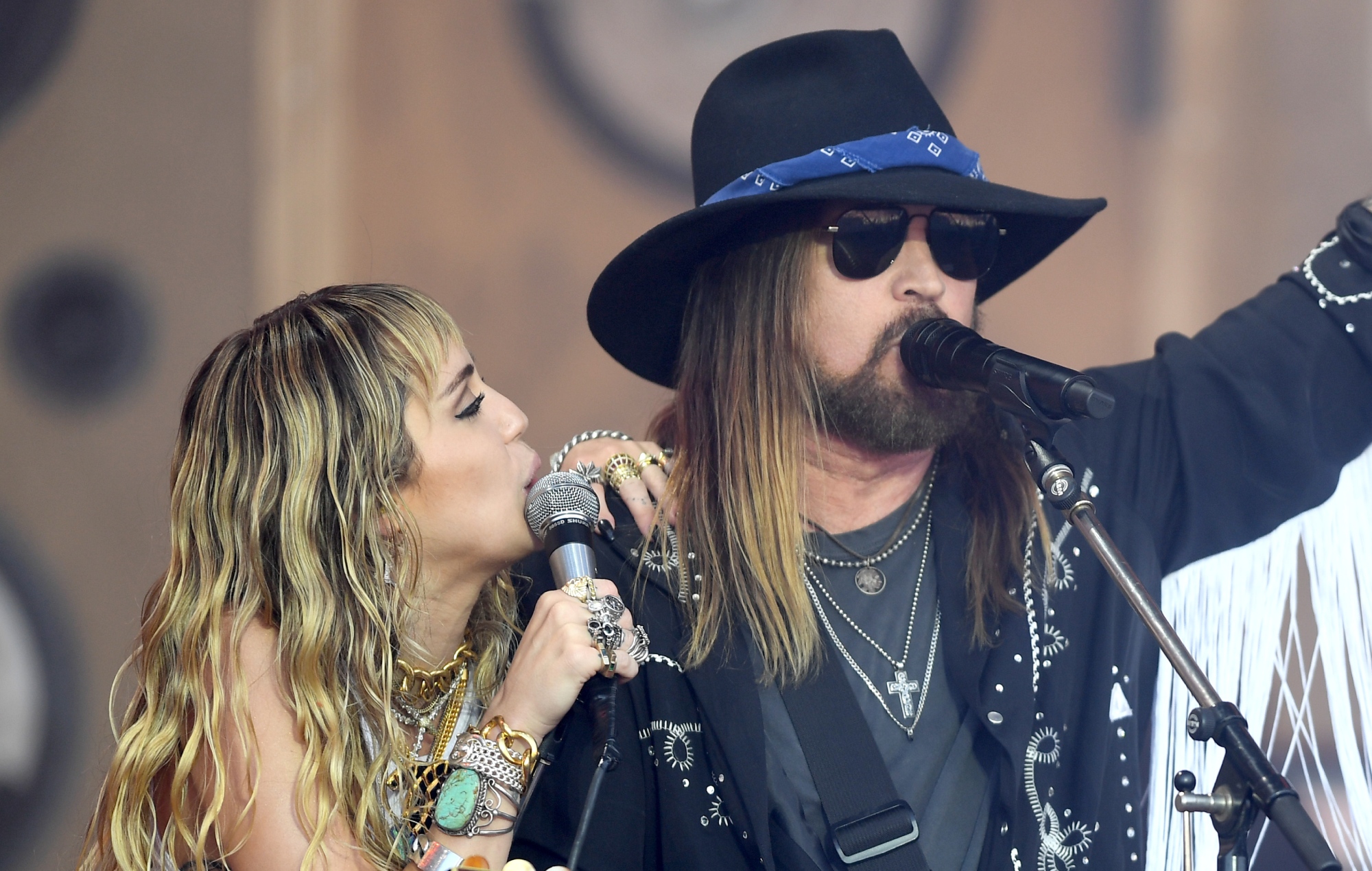Billy Ray Cyrus reacts to Miley dropping her surname