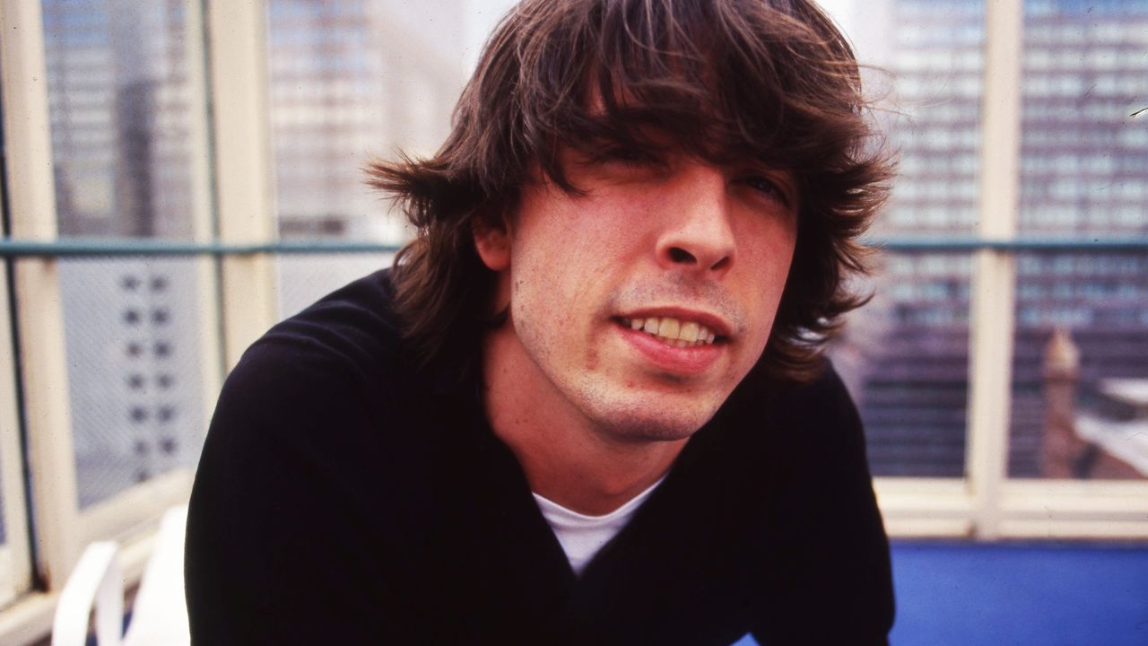 “His dad would come home from his night job and he had to sleep in the daytime. When he and his brother were too loud, his dad would give them military punishment.” What exactly is Foo Fighters frontman Dave Grohl whispering on Everlong?