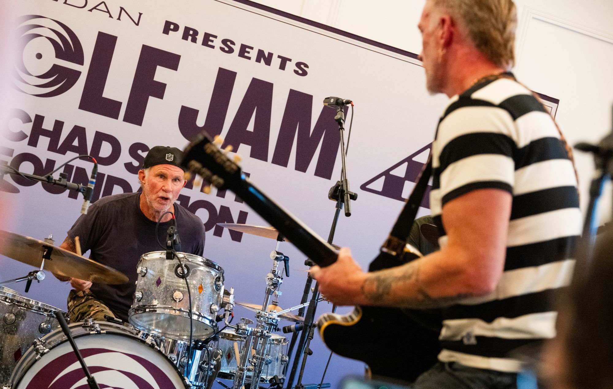 Watch Josh Homme, Chad Smith and Andrew Watt cover David Bowie, INXS, Tom Petty and more at Golf Jam charity event
